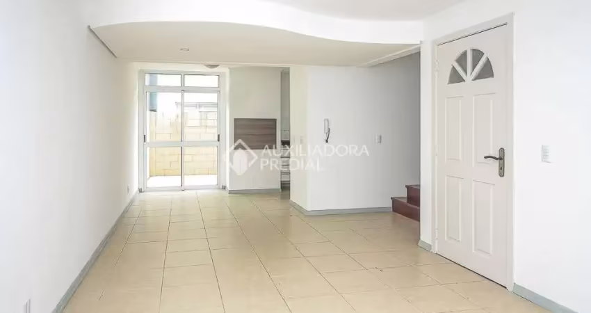 Casa em condomínio fechado com 3 quartos para alugar na Rua Augusto Attílio Giordani, 87, São Sebastião, Porto Alegre