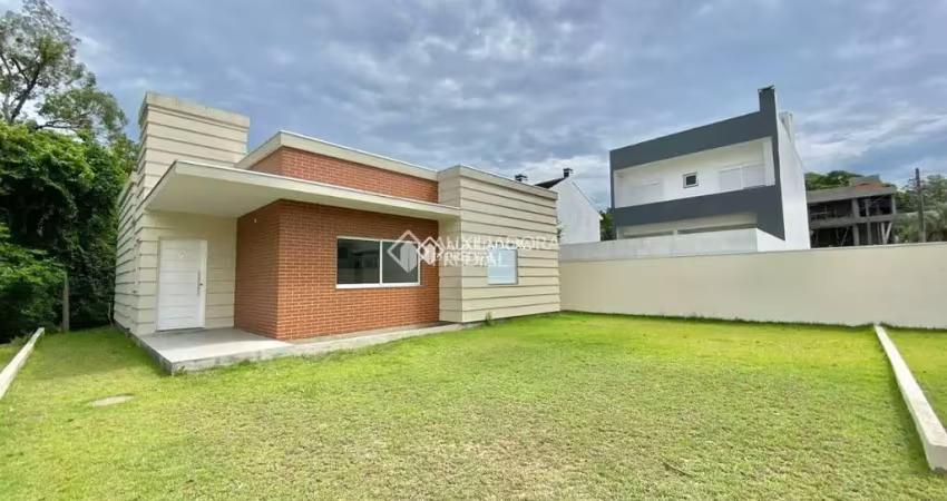 Casa em condomínio fechado com 3 quartos para alugar na Rua Canísio Binsfeld, 226, Hípica, Porto Alegre