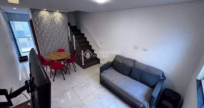 Casa em condomínio fechado com 2 quartos à venda na Rua Santa Bárbara, 392, Vila Caiçara, Praia Grande