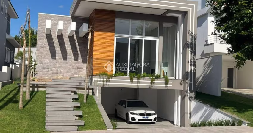 Casa com 3 quartos à venda na Urânio, 408, São Vicente, Gravataí