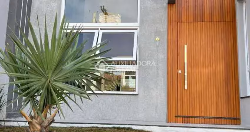 Casa com 3 quartos à venda na Rua Nelson Cidade de Souza, 160, Loteamento Jardim Timbaúva, Gravataí
