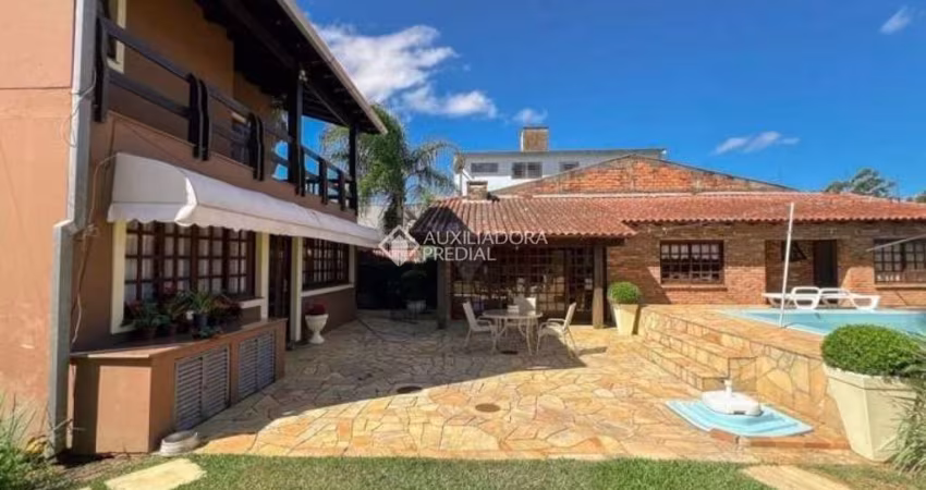 Casa com 4 quartos à venda na Rua Bernardino de Oliveira Fonseca, 215, Centro, Gravataí