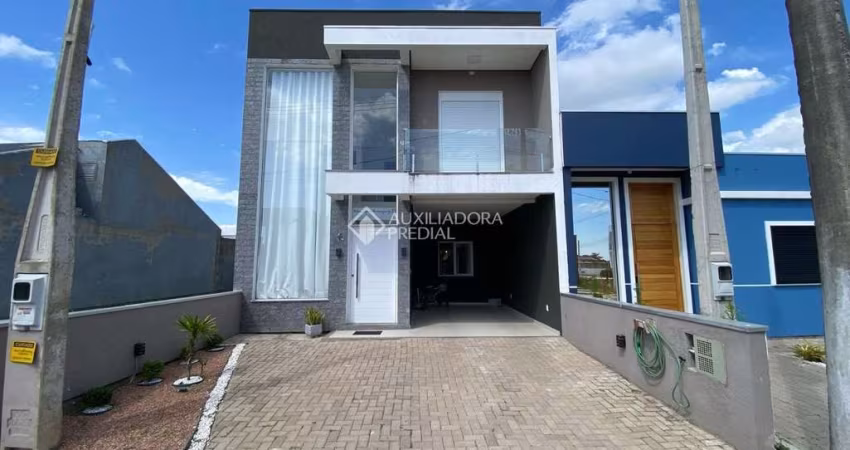 Casa com 3 quartos à venda na Alcides Gomes, 10, Parque dos Anjos, Gravataí