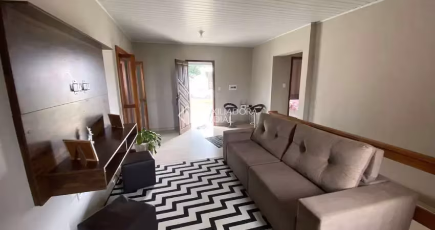 Casa com 3 quartos à venda na Coronel Aparício Borges, 487, Formoza, Alvorada