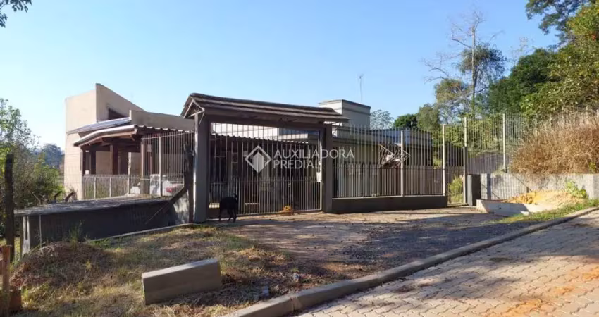 Casa em condomínio fechado com 4 quartos à venda na Rua Almirante Barroso, 1, Recanto Corcunda, Gravataí