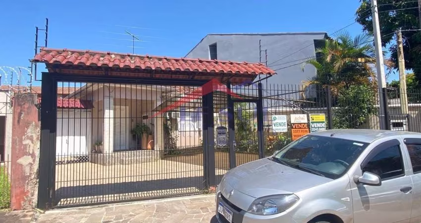 Casa com 4 quartos à venda na Rua Afonso Arinos, 909, Camaquã, Porto Alegre