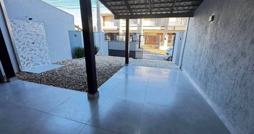 Casa moderna em piçarras: 3 quartos, suíte e living integrado!