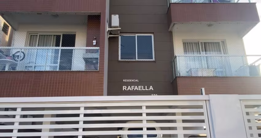 Apartamento de 02 dormitórios sendo 01 suíte, com vaga de garagem coberta no Centro de Palhoça - SC
