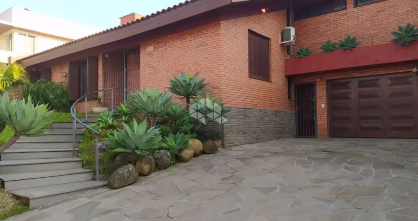 Casa com 4 quartos à venda na Rua Professor Fernando Carneiro, 287, Três Figueiras, Porto Alegre