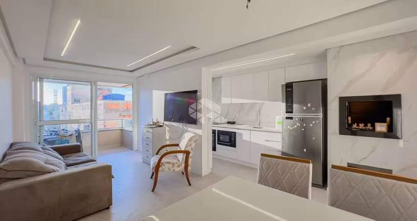 Apartamento com três quartos e duas vagas, no Passo da Areia