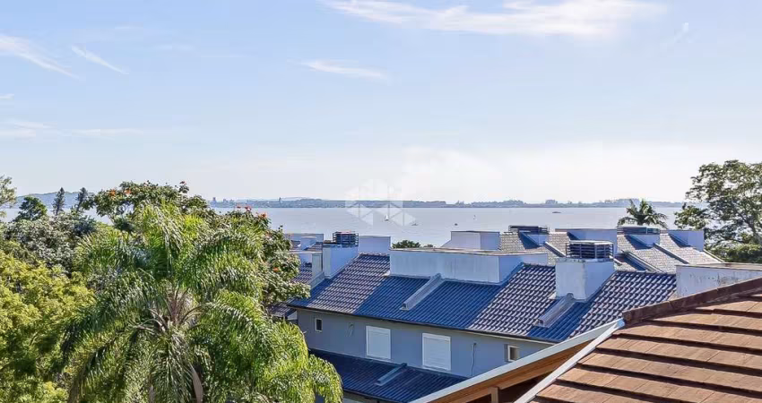 CASA EM CONDOMÍNIO COM VISTA PARA O GUAIBA