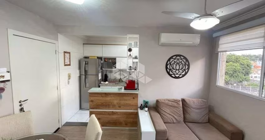Apartamento com dois quartos, suíte e vaga