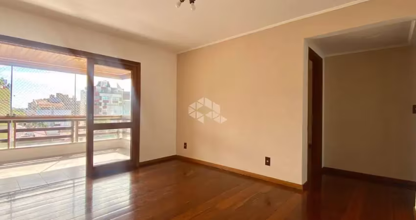Apartamento 03 quartos com suíte, sacada integrada com churrasqueira em rua tranquila.