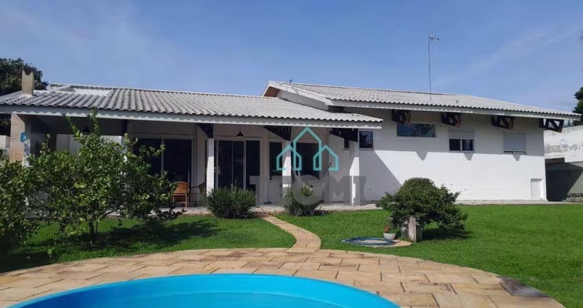 Casa com 4 dormitórios à venda, 346 m² por R$ 2.100.000,00 - Condomínio Vale do Sol - Tremembé/SP