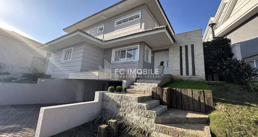 Casa em condomínio fechado com 3 suítes e elevador, à venda no Campo Comprido - Curitiba/PR