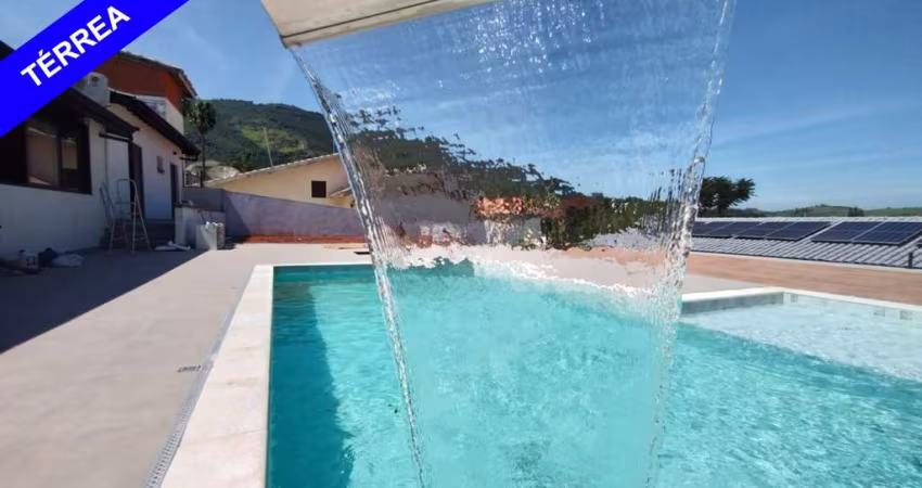 CASA TÉRREA CONDOMINIO FLAMBOYANT COM CASA HOSPEDE, QUINTAL E PISCINA