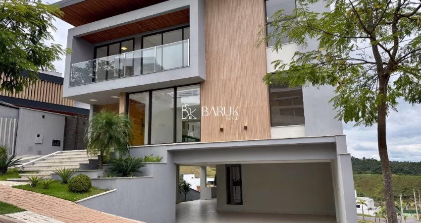 Casa com 4 suítes e 4 vagas no condomínio Estrela Alta