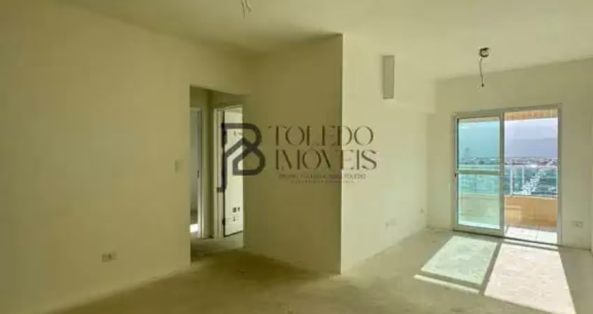 Apartamento de 2 dormitórios sendo 1 suíte, prédio frente mar no bairro vila mirim - praia grande