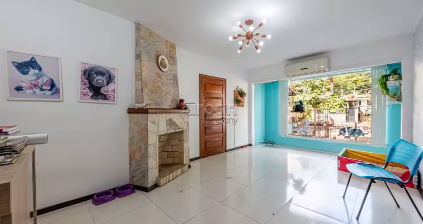 Casa em condomínio fechado com 4 quartos à venda na Rua Eudoro Berlink, 946, Auxiliadora, Porto Alegre