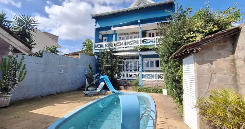 Casa em condomínio fechado com 3 quartos à venda na Rua Itapema, 156, Vila Jardim, Porto Alegre