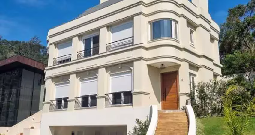 Casa em condomínio fechado com 4 quartos à venda no Cacupé, Florianópolis 
