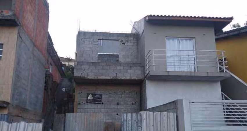 Casa em fase de acabamento com Escritura em Terra Preta.