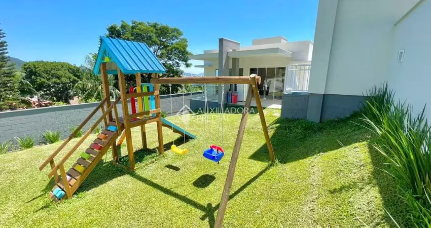 Terreno em condomínio fechado à venda na Rua Homero de Miranda Gomes, 1411, Fundos, Biguaçu