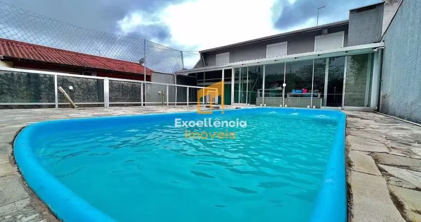 Sobrado com piscina perto do mar