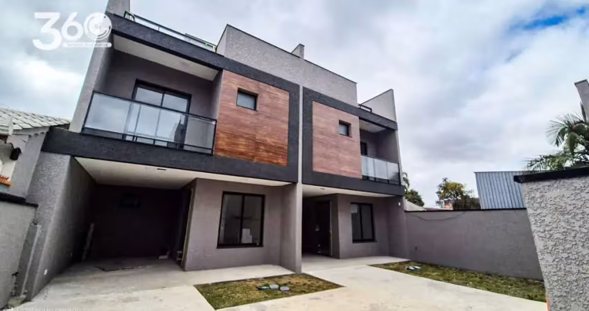 Sobrado com belo terraço, cozinha ampla e churrasqueira
