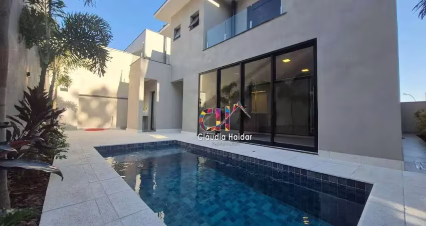 Casa com 3 dormitórios à venda, 310 m² por r$ 2.990.000,00 - condomínio reserva do itamaracá - valinhos/sp