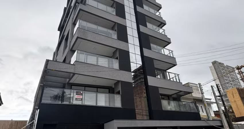 OPORTUNIDADE APARTAMENTO NO CENTRO DE BALNEARIO PIÇARRAS COM TRES QUARTOS SENDO UMA SUITE