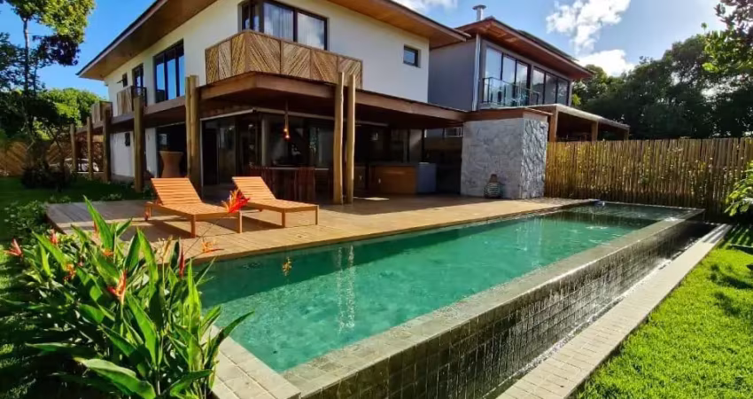 Casa de alto padrão com 5 suítes à venda, porteira fechada, no condomínio praia bella com acesso privativo à praia, localizado na praia do forte - bahia -