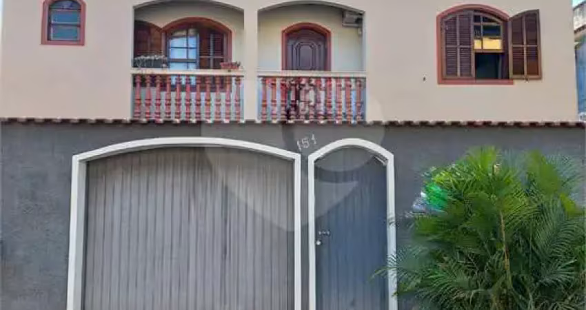 Casa com 4 quartos à venda na Madame Curie, Vila Mury, Volta Redonda