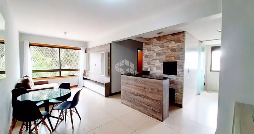 APARTAMENTO SEMI-MOBILIADO À VENDA, COM 3 DORMITÓRIOS, 1 SUÍTE, CHURRASQUEIRA E VAGA DE GARAGEM