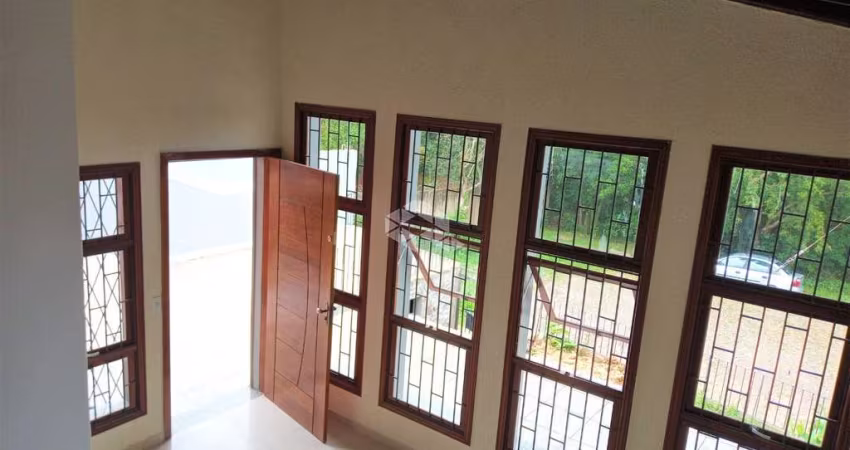 Casa com 3 (tres) dormitórios, 1 (uma) vaga de garagem, no Bairro Espírito Santo em Porto Alegre/RS