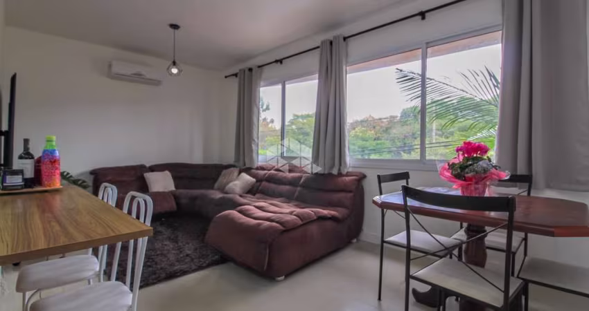 Apartamento com 2 dormitórios, sendo 1 suíte e 1 vaga no bairro Jardim Botânico