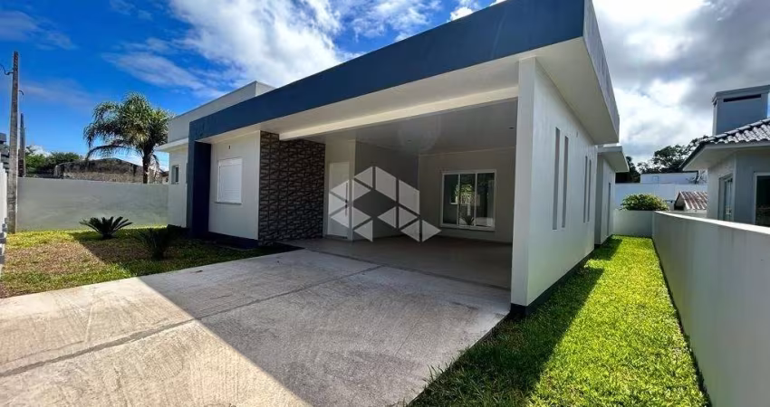 CASA COM 2 DORMITÓRIOS, SENDO 1 SUÍTE
