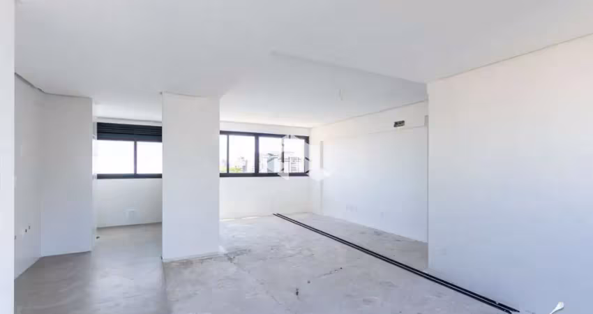 Apartamento de dois dormitórios com duas garagens, no menino deus