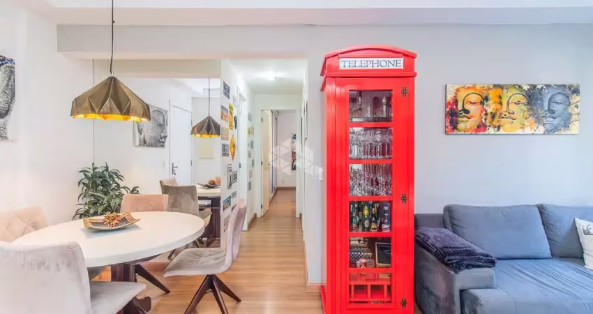 Apartamento de 2 dormitórios com suíte, móveis planejados e vaga dupla em localização privilegiada!