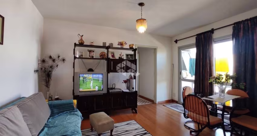 Apartamento central de 2 dormitórios!