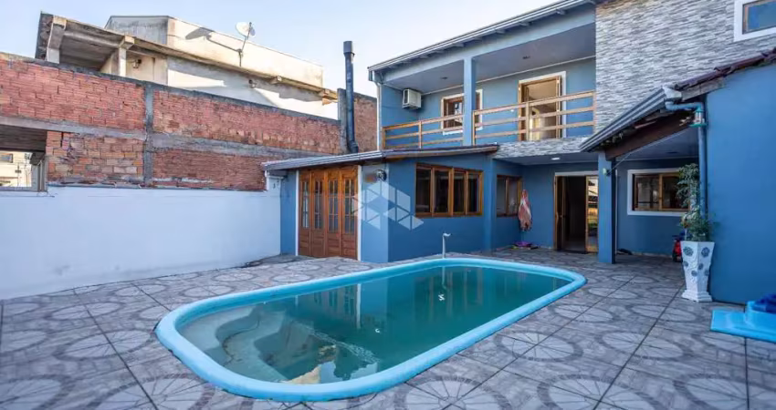 Casa sobrado 3 dormitórios, 1 suíte, área gourmet/churrasqueira, lavanderia, piscina /2 vagas, no bairro igara/ canoas. aceita negociação.