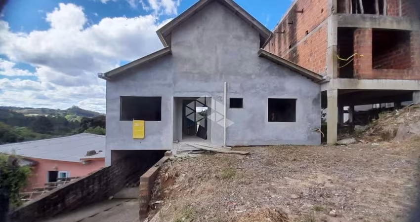 Casa em construção no bairro Centenario