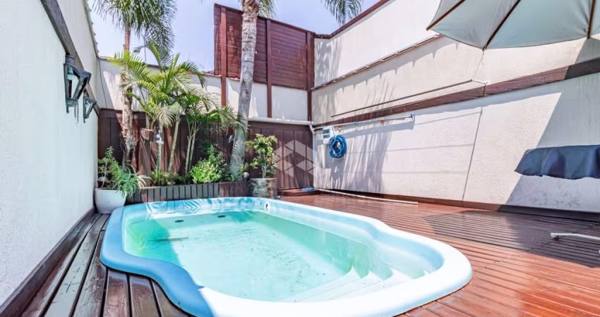 Casa 3 dormitórios suíte master com piscina 2 vagas no Bairro Hípica Zona sul de porto alegre