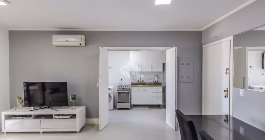 2 dormitórios, suíte, churrasqueira e 2 vagas na Av. Nilo Peçanha!