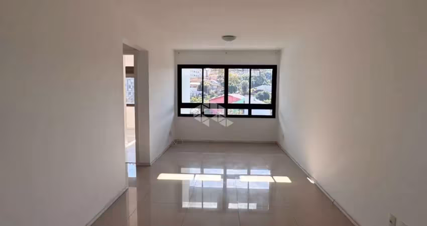 Apartamento com dois quartos, churrasqueira e box, no jardim do salso