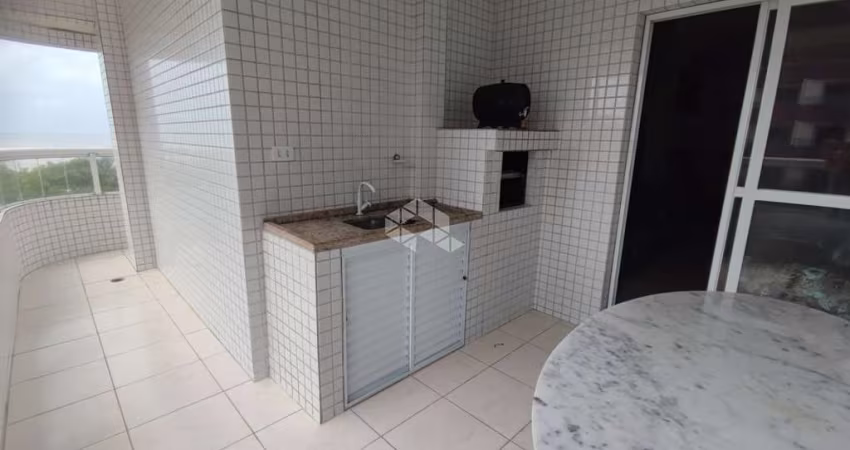 Apartamentoa venda na praia grande na vila mirim com 2 quartos, 1 suite e 1 vaga