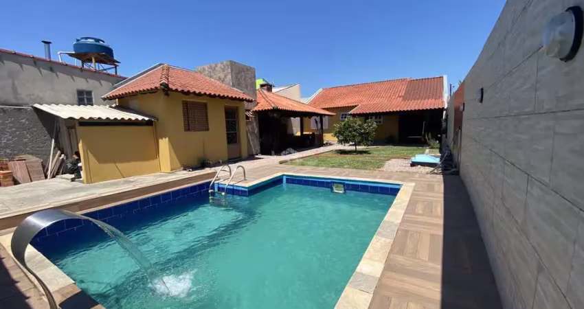 Casa a venda no jardim dos lagos, guaiba, 2 dormitórios, jardim, quiosque, piscina e poço artesiano