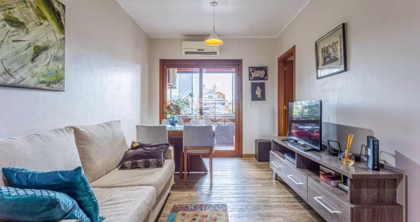 Apartamento de 2 dormitórios com sacada integrada e churrasqueira  com  vaga coberta no bairro Jardim Lindóia