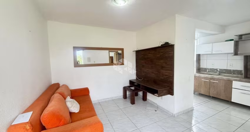 Apartamento de 2 dormitórios e 1 vaga de garagem, localizado no bairro Partenon, em Porto Alegre.
