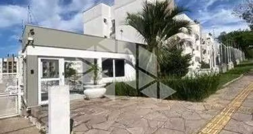 Apartamento térreo com 60 m², 2 dormitórios, churrasqueira e 1 vaga na Cavalhada